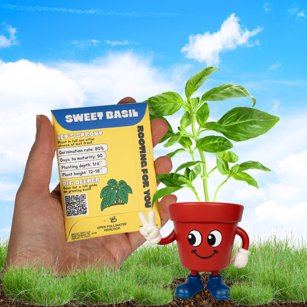 A hand holds a yellow packet of Sweet Basil seeds next to a small potted basil plant in a red cartoon pot with a smiling face, set against a digital background of blue sky and green grass.