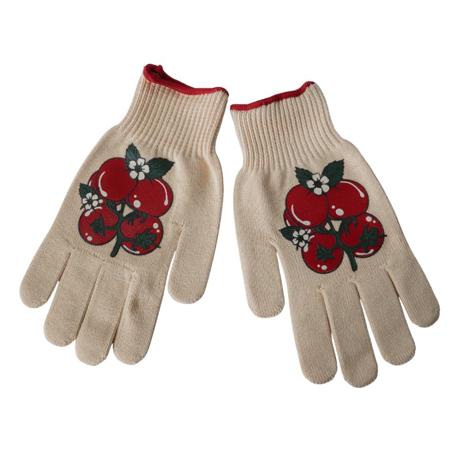 Pair of beige gloves with red tomato design on a white background