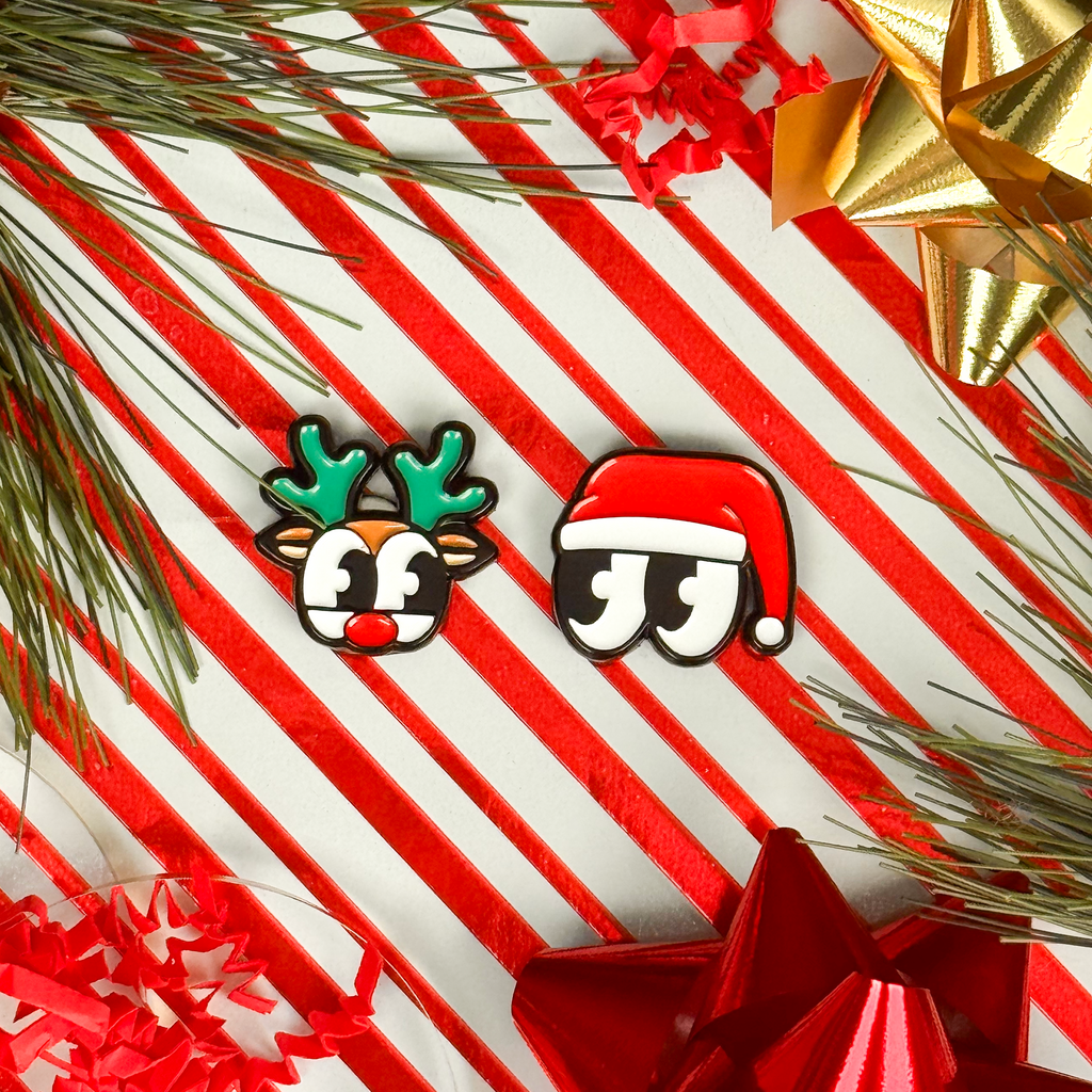 Two Christmas-themed earrings on a candy cane background with red bows and greenery.